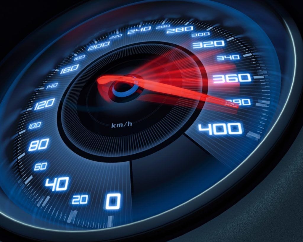 image of a Speedometer scoring high speed in a fast motion blur representing speeding up a website